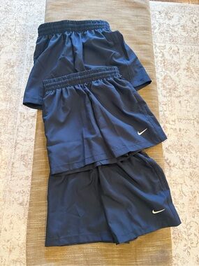 3 pairs of Nike Boys Navy Blue Athletic Shorts with Swoosh.